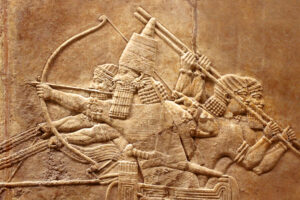 Assyrian stone relief carving.